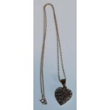 A stamped 375 9ct gold necklace having a 9ct gold heart shaped pendant set with white stones. Weight