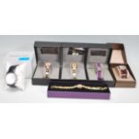 A collection of unused cased ladies dress watches to include a Jacob Thomas square face set to a