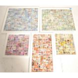 A collection of five various sized 20th Century  world stamps set within five glazed picture frames,