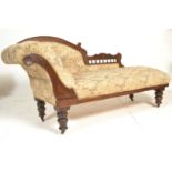 A 19th century Victorian mahogany chaise lounge / day bed with tapestry upholstered button back