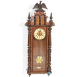 A 19th Century Victorian walnut cased Vienna regulator wall clock in the manner of Gustav Becker,