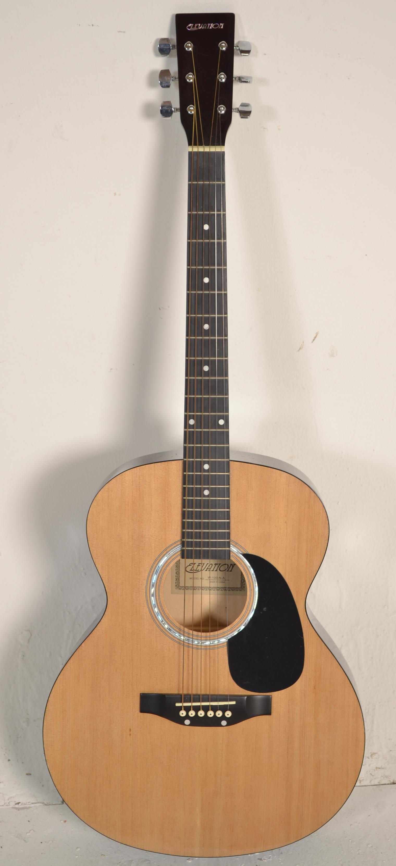 A 20th century ' Elevation ' six string acoustic guitar. Excellent condition, little used.