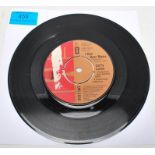 Vinyl 7" 45 RPM single record by Larry Lurex (Freddie Mercury) – I Can Hear Music / Goin' Back –