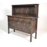 A good early 20th century ipswitch oak sideboard dresser. Raised on squared legs with a series of