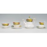 A Paragon fine bone china bachelors tea service in the Springtime pattern having gilt detailing. The
