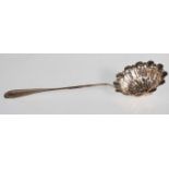 A French silver Victorian tea strainer spoon of reeded form with pierced decoration. Stem stamped