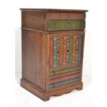 A 20th century unusual wooden bookcase cabinet. The pedestal body in the form of leather bound books