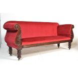 A 19th Century Victorian mahogany carved framed double scroll end sofa settee being upholstered in