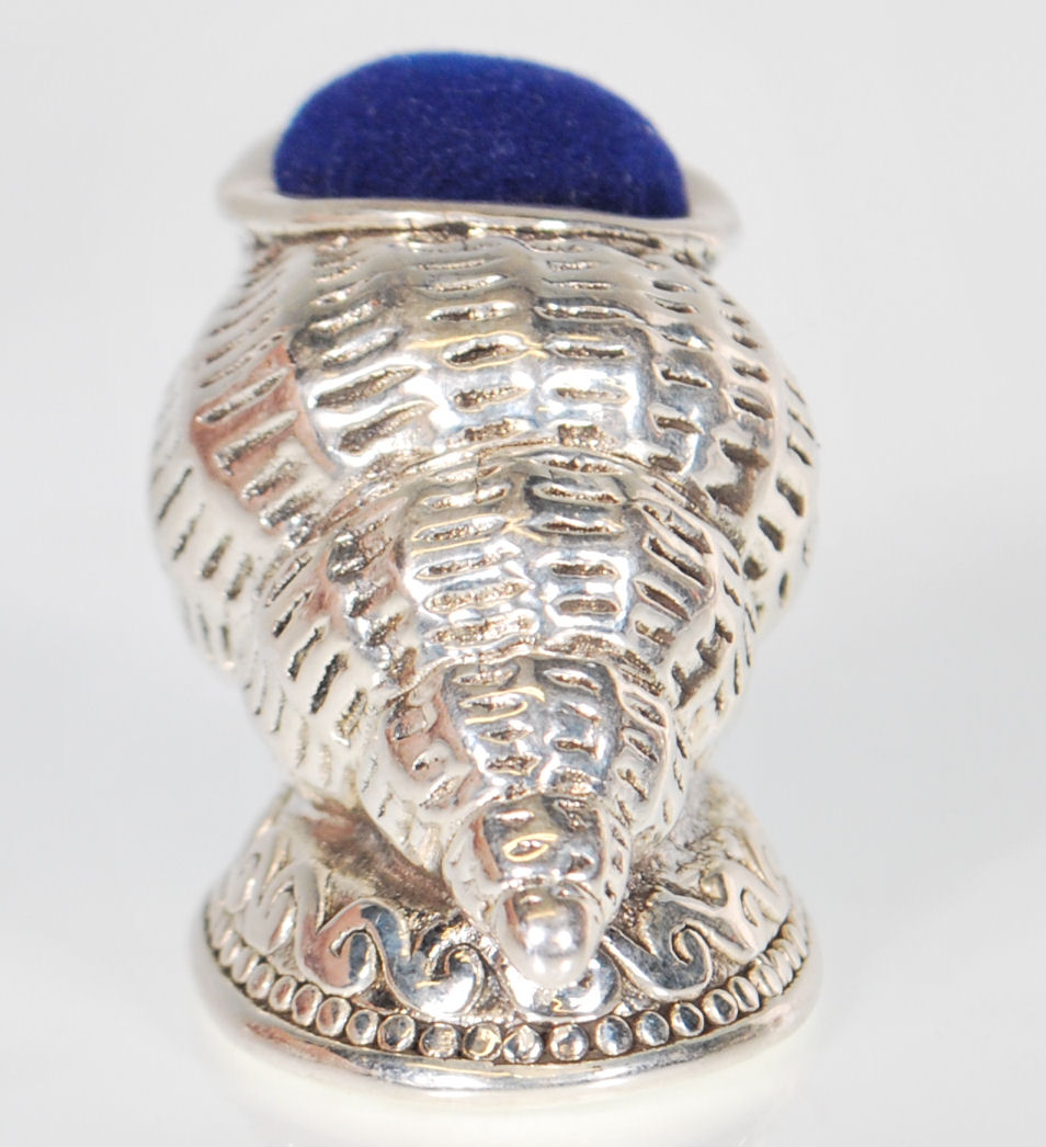 A stamped 925 silver pin cushion in the form of a conch shell raised on a footed base with a blue - Image 2 of 7