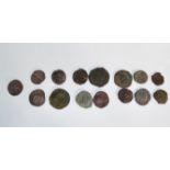A collection of Ancient Roman coins to include Antonius Pious Denarius, Trajan Denarius, Theodosius,