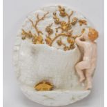 A 19th century Royal Worcester Hadley  pottery wall pocket of glazed cream form adorned with a