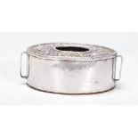 A Tibetan silver Buddhist portable shrine Gau box of round form, the lid having a central recess