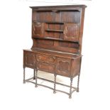A good 17th century Jacobean revival solid oak pot board country dresser. The dresser base with