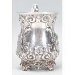 A mid 19th century silver hallmarked tankard cast in relief. Sheffield 1855 by Martin Hall & Co.