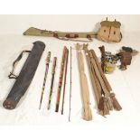 A  collection of fishing rods and reels to include S Allcock & Co Lrd 3 piece cane rod approx