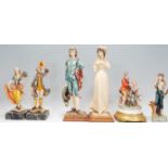 A group of Italian ceramic figurines to include a Capodimonte figurine of a boy leaning on a tree