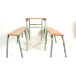 A set of  mid century retro enamel painted tubular metal and wooden refectory benches. Each with