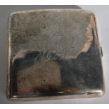 A silver hallmarked cigarette case bearing central monogram to front. Hallmarked for Henry