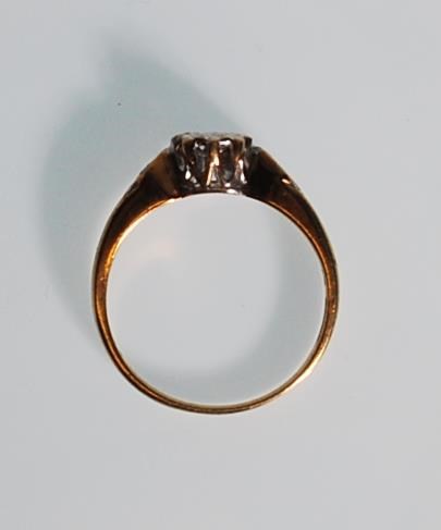 A hallmarked 9ct gold and diamond ring. The ring having a central diamond within a white and - Image 4 of 6