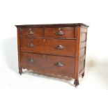 A late 19th century serpentine fronted mahogany chest of drawers. Raised on hairy paw feet with