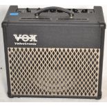 A Vox ' Valvetronix ' model AD30VT musical instrument or guitar amplifier / amp. Various knobs to