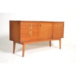 A retro 20th Century Danish manner teak wood sideboard credenza having a bank of three drawers to