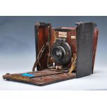 An early 20th Century Edwardian Sanderson Hand Camera, 4x5”, with J. H. Dallmeyer No.3 Stigmatic