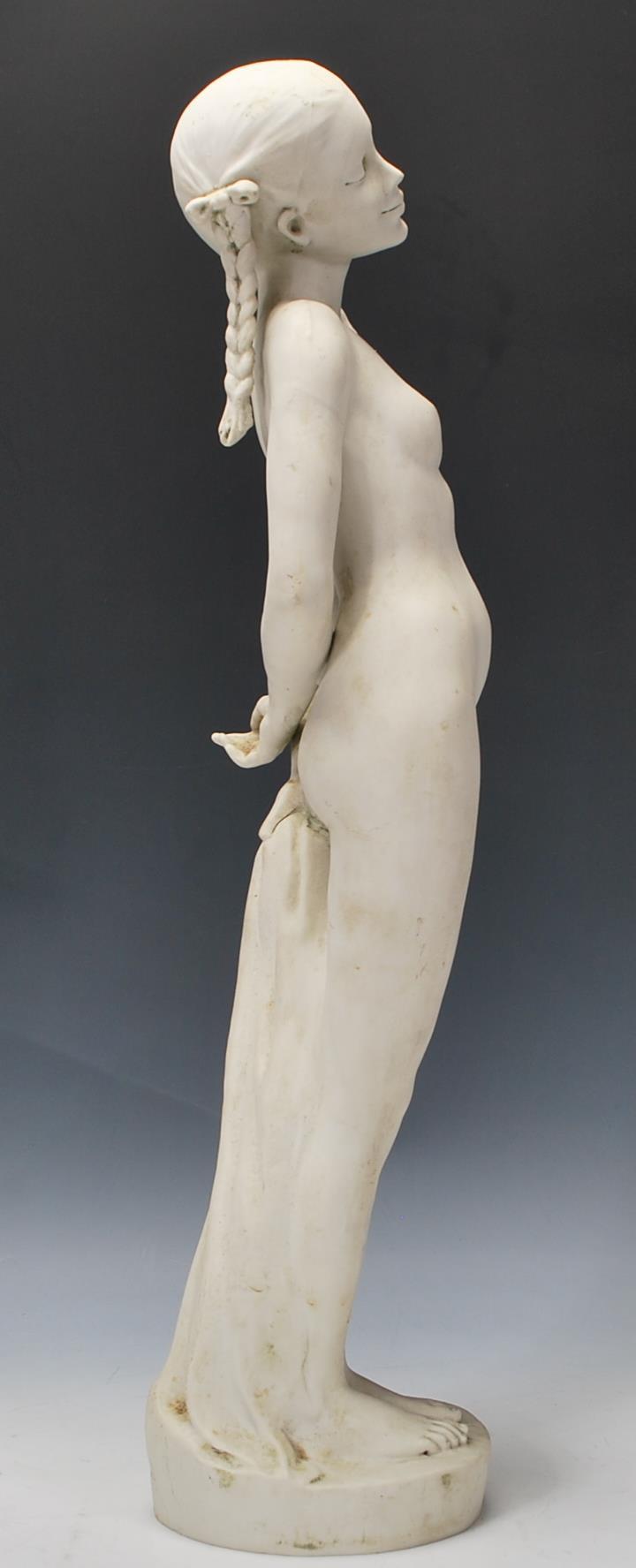 A 20th Century blanc de chine ceramic bisque standing figurine depicting a nude woman having plaited - Image 2 of 6