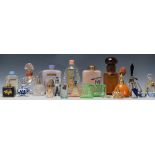 A collection of vintage 20th Century perfume bottles and atomisers to include Art Deco examples,