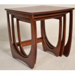 A retro 20th Century teak wood nest of three graduating  occasional tables together with a retro two