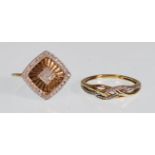 TWO 9CT GOLD AND DIAMOND RINGS