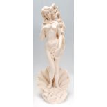 A 20th century composite figurine in the form of Botticelli's Venus raised on a naturalistic shell