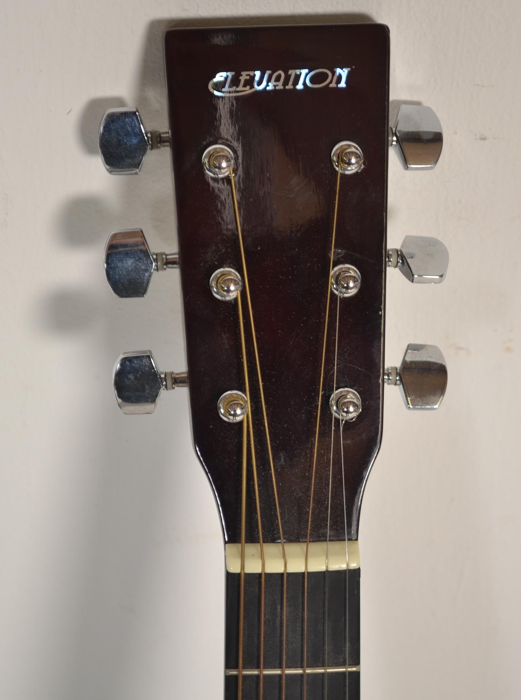 A 20th century ' Elevation ' six string acoustic guitar. Excellent condition, little used. - Image 2 of 5