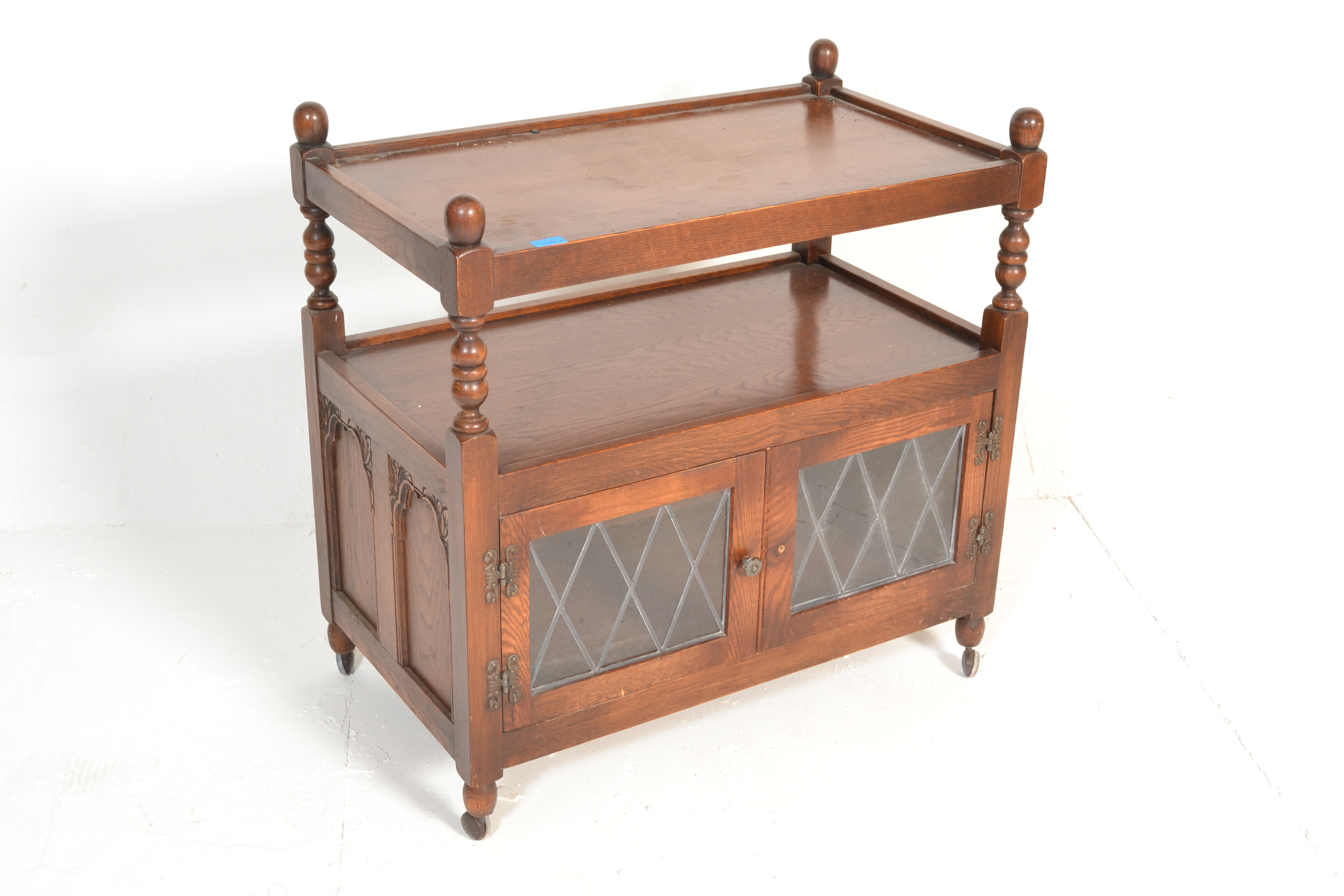 A 20th Century  oak Jaycee lead glazed two-door buffet / drinks trolley, two tiers over glazed - Image 2 of 5