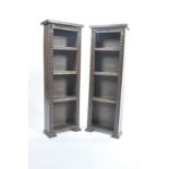 A good pair of 19th century Victorian solid gothic oak open window upright bookcases. Each with