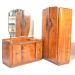 A 1920's Art Deco walnut bedroom suite comprising mirrored dressing table and wardrobe, the wardrobe