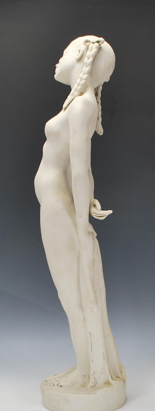 A 20th Century blanc de chine ceramic bisque standing figurine depicting a nude woman having plaited - Image 4 of 6