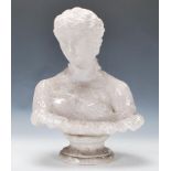 An early 20th Century plaster of a female classical figurine bust, raised on a square base,