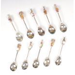 SET OF TEN HALLMARKED SILVER QUEENS BEASTS SPOONS