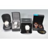 A collection of gents boxed unused dress wristwatches to include a Christin Lars white face datejust