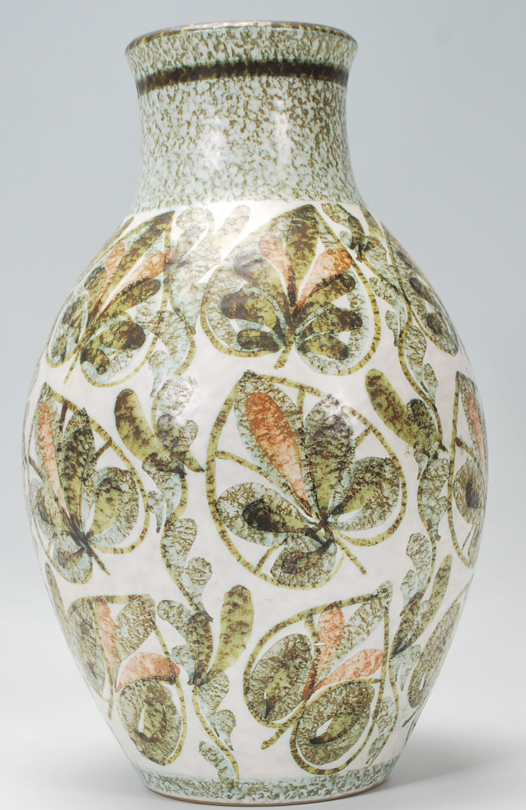 An early 20th Century Bourne Denby pottery vase by Glyn Colledge, decorated with stylised leaves,