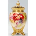 ROYAL WORCESTER LIDDED POT. A large hand decorated with fruit and floral detailing Royal Worcester