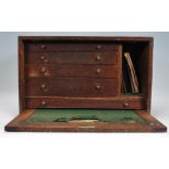 A vintage mid 20th Century mahogany engineers work box, carry handle to top with up and over cover
