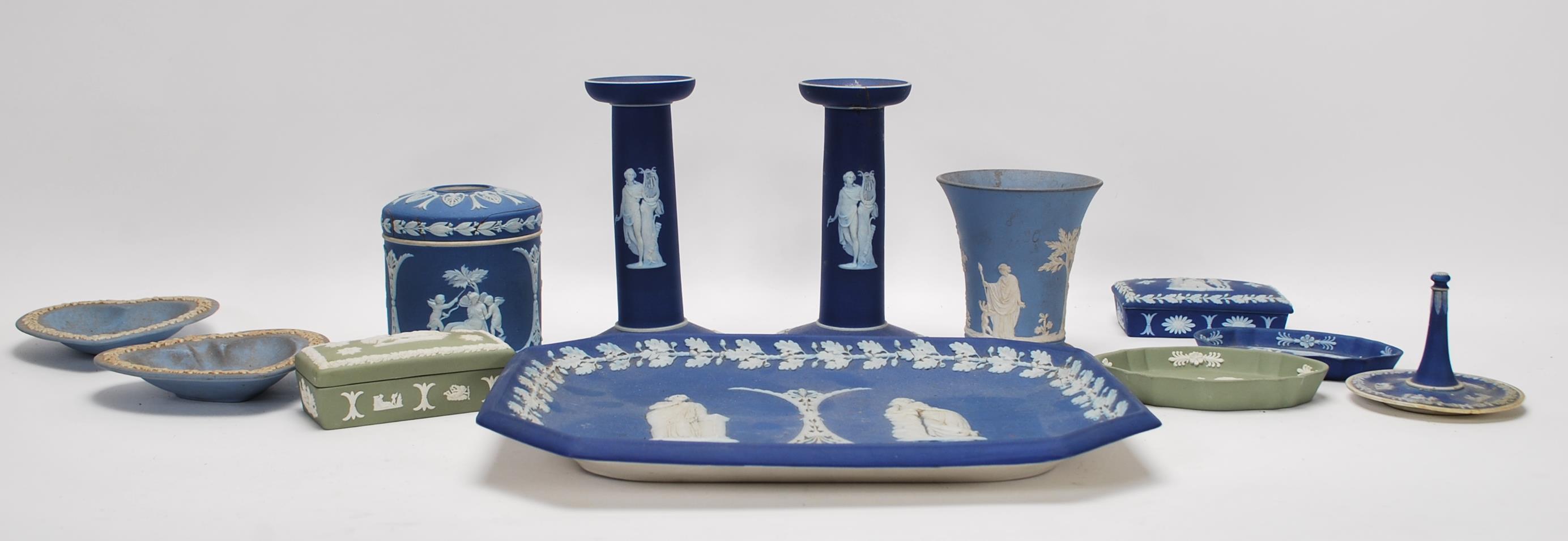 A collection of Wedgwood jasper-ware to include a pair of 19th Century cobalt blue candlesticks, hat