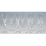 A set of eight 20th century Crystal cut glass champagne glasses, having faceted tapering bowls