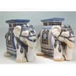 Two large 20th Century Chinese elephant plant stands. Each of decorative form, with both having a