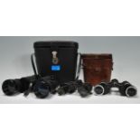 A group of three binoculars to include a pair of Hans Weiss optik 16x50 binoculars and two WWI