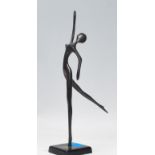 A Bodrul Khalique cast bronze figural sculpture ornament depicting an elongated abstracted female