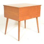 A retro 20th Century teak wood sewing / work box, hinged top opening to reveal appointed interior