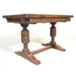A good quality 20th century oak refectory draw leaf dining table being raised on bulbous turned